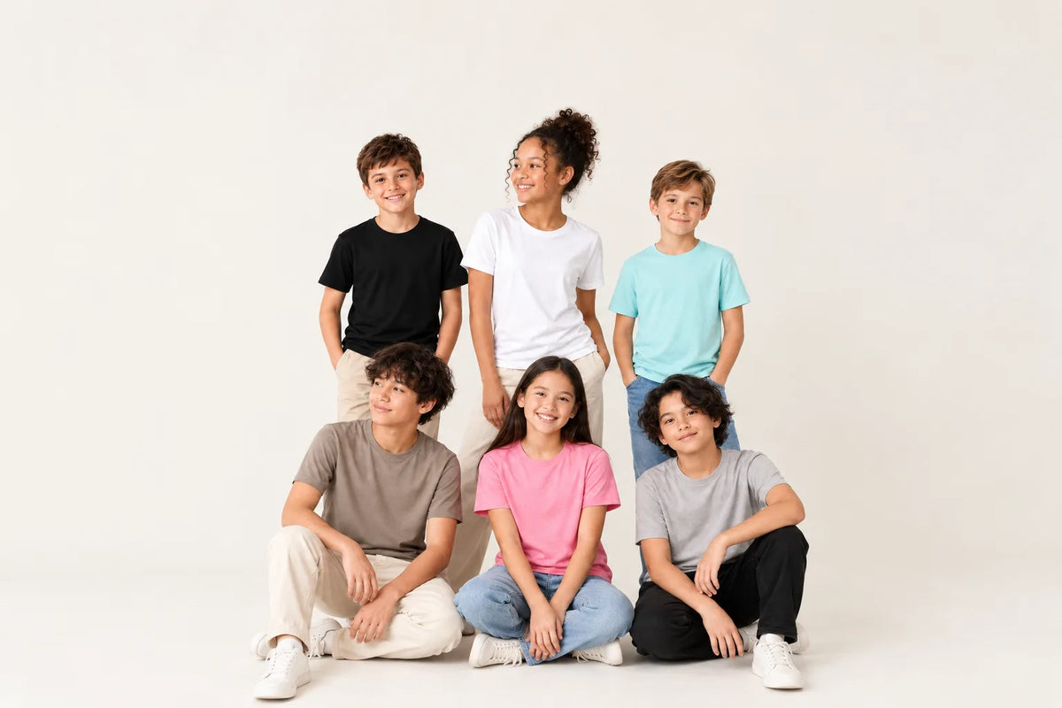 Assorted children's clothing collection featuring kids in casual t-shirts and jeans